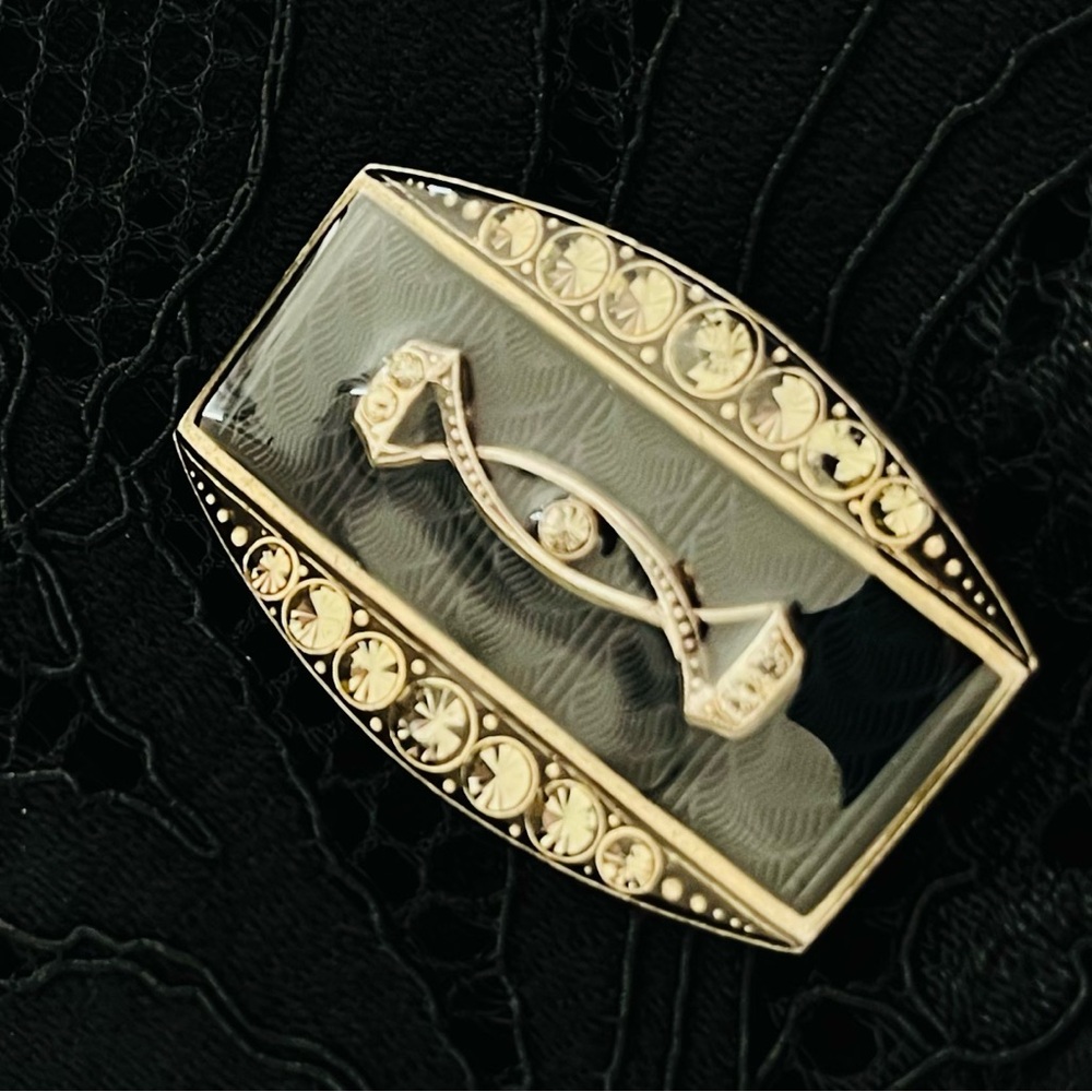 Catherine Popesco black enamel pin from France